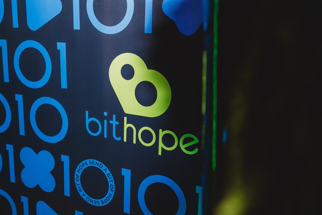 Close-up of the bithope logo on the branded backdrop at the Bithope Foundation 10-year anniversary event in Sofia.
